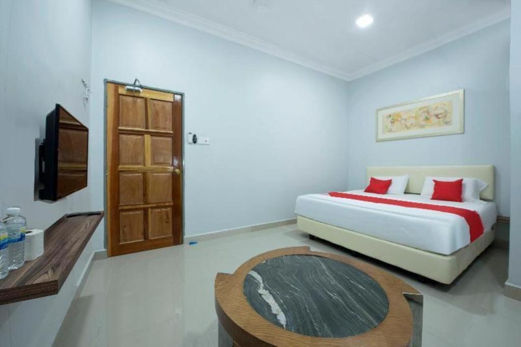 Oyo 90234 Sungai Rengit City Resort 2 Kampung Sungai Rengit Esterno foto